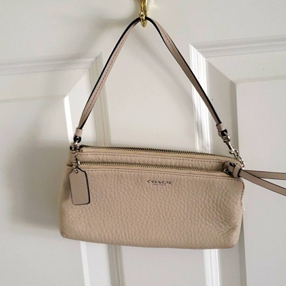 Beige Coach wristlet